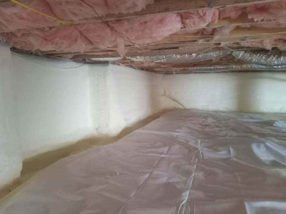 Crawl space encapsulation with closed-cell spray foam for Roof Maintenance in East Riverdale